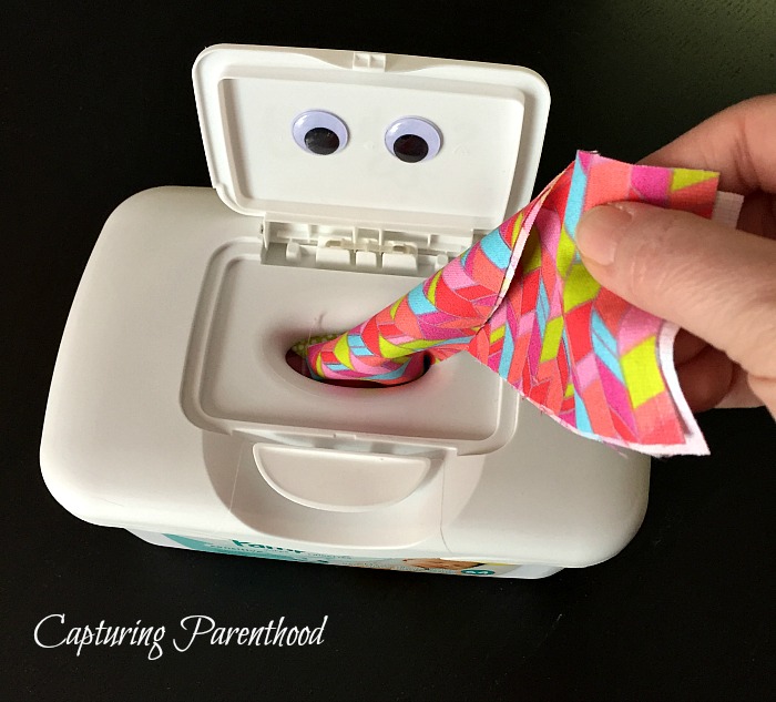 Old baby wipes container as a snack box for