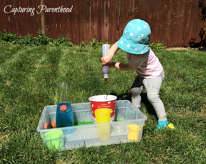 Pouring Station - The Perfect Summer Activity for Toddlers © Capturing Parenthood