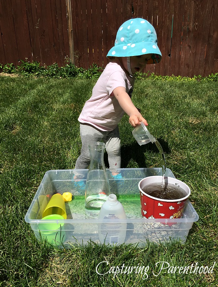 Pouring Station - The Perfect Summer Activity for Toddlers © Capturing Parenthood