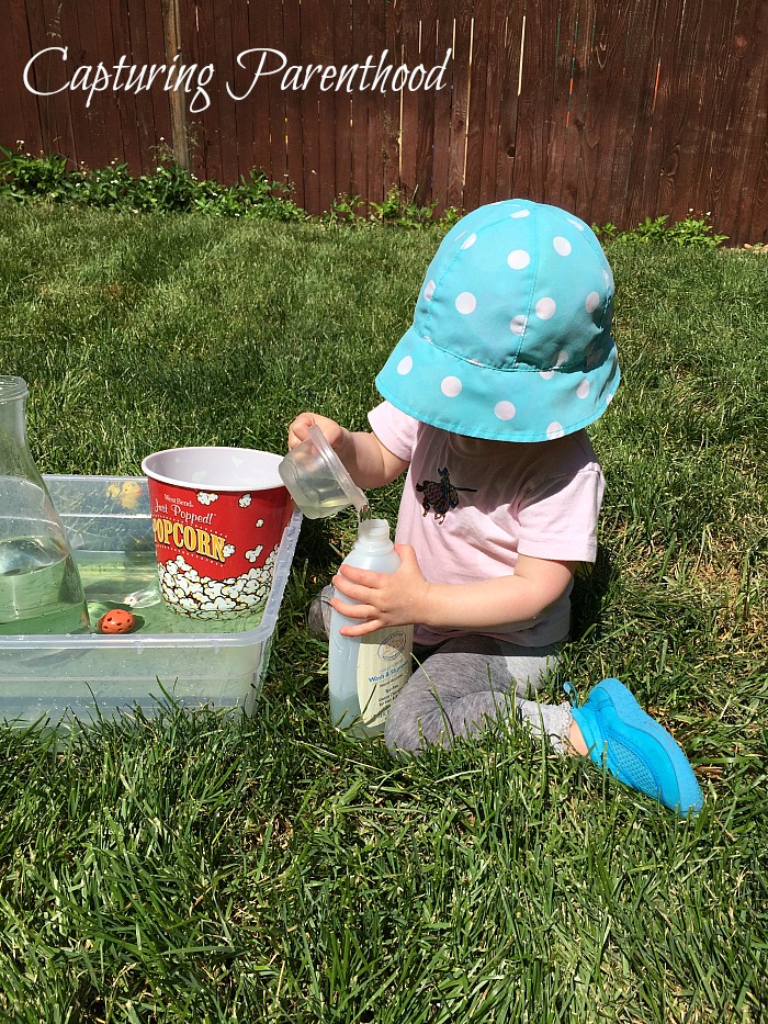 Pouring Station - The Perfect Summer Activity for Toddlers © Capturing Parenthood