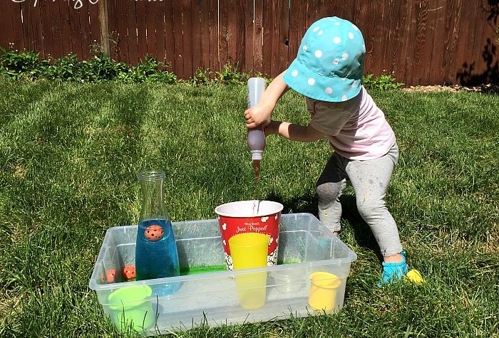 Pouring Station - The Perfect Summer Activity for Toddlers © Capturing Parenthood