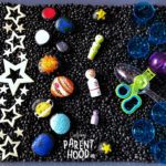 Space Sensory Bin with Painted-Rock Solar System