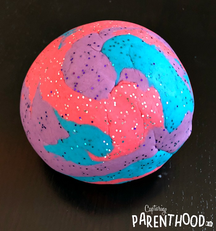 Celestial playdoh for starry starry nights! Add a bit of glitter to black  playdoh, some stars and planet marbles and you …